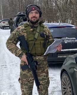Николай